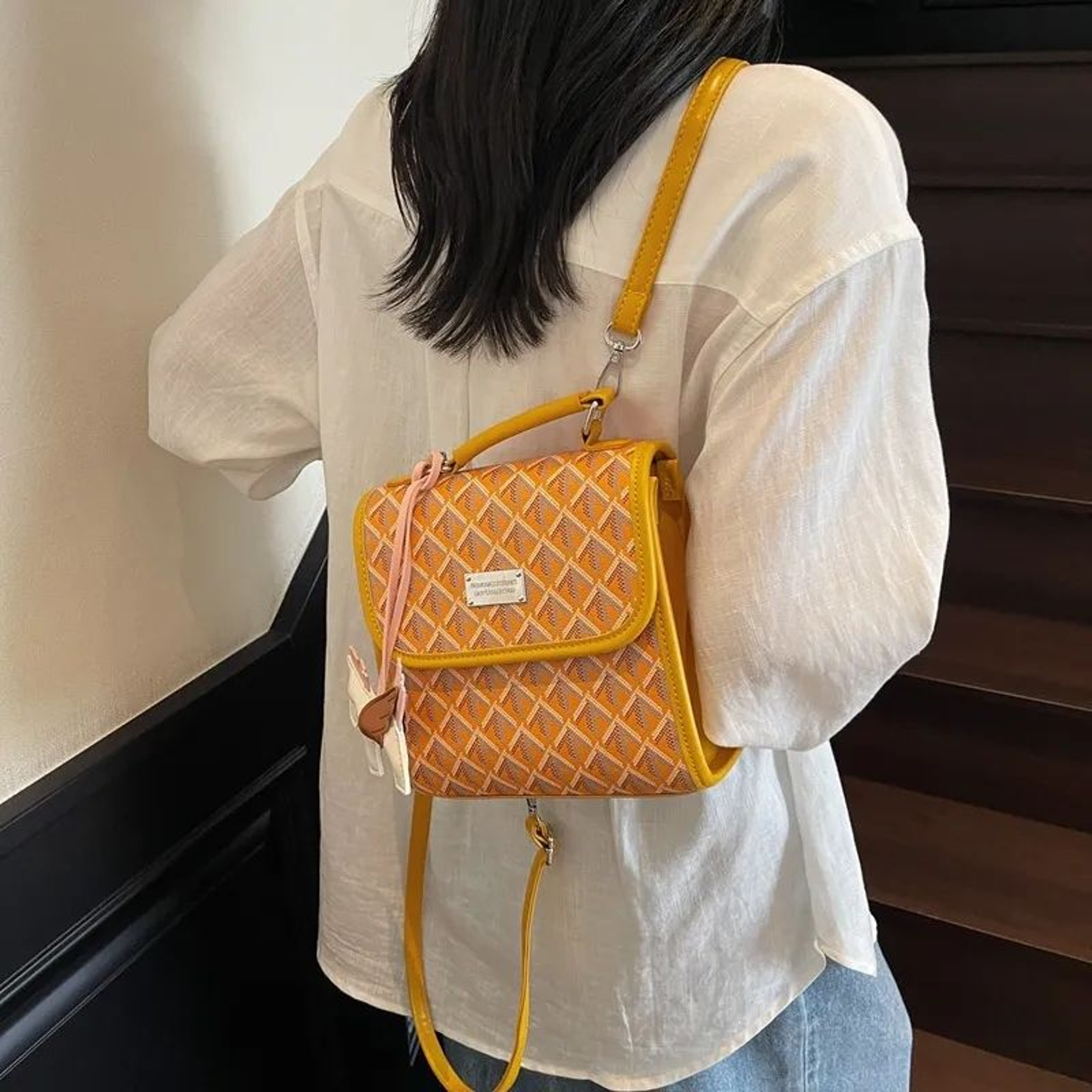 Womens Printed Backpack With Handheld Design In Black Yellow And Brown 1