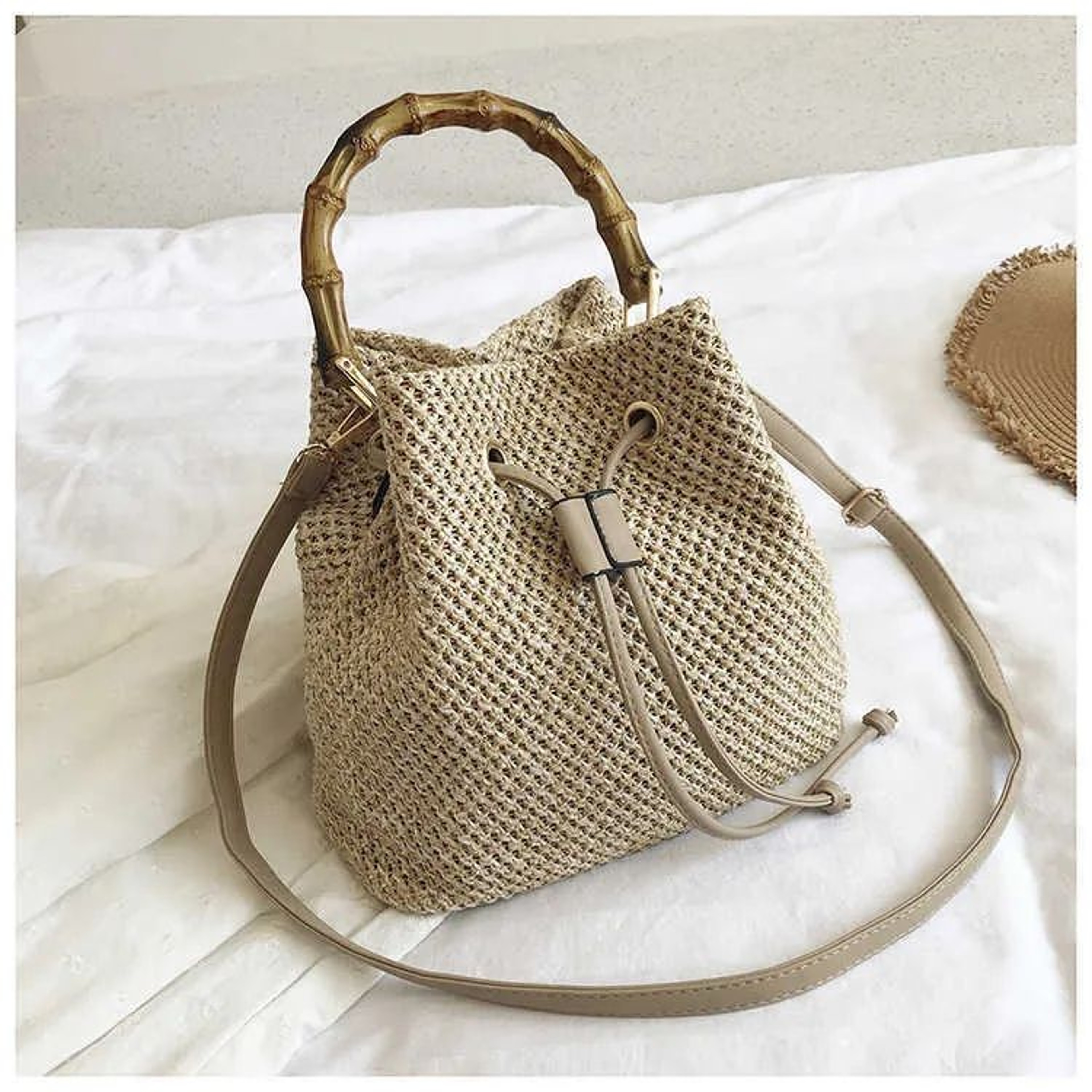 Woven Straw Bucket Bag For Women With Bamboo Handle And Crossbody Design 1