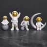 4Piece Astronaut Figurine Set Resin Space Decor Statues For Desk Shelf And Kids Room 8