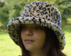 Faux fur bucket hat in leopard print. Fashion hat with animal print cheetah. Cute fluffy hat for women. Fuzzy, furry hat