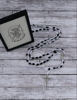 Rosary Laying.png