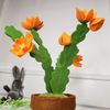 fake easter cactus on the table and Grey easter bunny.JPG