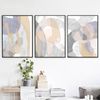 three modern abstract posters in beige tones that can be downloaded and hung on the wall 3