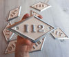 112 apartment number sign metal rhomb