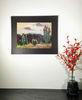 landscape painting hanging on the wall