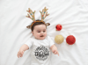 onesie-mockup-featuring-a-baby-wearing-reindeer-antlers-m6222-r-el2.png
