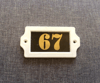 address door number sign 67