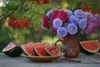 Photo of colorful bouquet of asters and watermelon