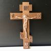 Wooden wall cross with copper crucifix