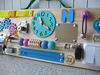 wooden-busy-board-with-clock-and-zipper-1