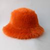 Orange-pumpkin bucket hat made of faux fur. Cute fuzzy bucket hats.