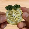 A crochet slice of lemon hair clip pattern