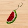 a crochet watermelon keychain pattern