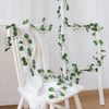 q7rh210Cm-Artificial-Hanging-Christmas-Garland-Plants-Vine-Leaves-Green-Silk-Outdoor-Home-Wedding-Party-Bathroom-Garden.jpg