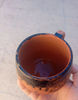 Handmade Moroccan Clay Cup adorned with traditional tar-paint.JPG