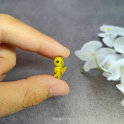 awesome miniature dragon. micro crochet toy. miniature. little dragon.