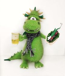 Crochet dragon with beer and kebab