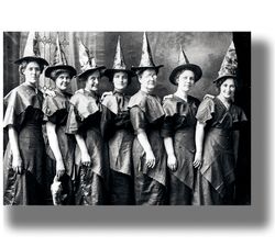 a coven of witches poses for a portrait at a halloween party. vintage victorian photography poster. halloween gift. 807.
