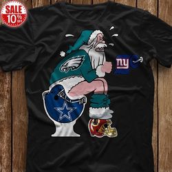Philadelphia Eagles Santa Sits On Dallas Cowboys Toilet T Shirt Hoodie Sweater Mug Tshirt Hoodie Sweater