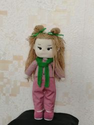 A doll, the doll in pink, doll, knitted doll, interior doll, game doll, doll in clothes