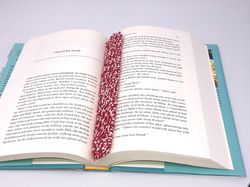 handmade knitted red and white bookmark