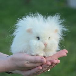 Realistic rabbit. Angora rabbit. Felted animal. White angora. White rabbit toy