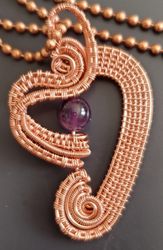 Amethyst in copper pendant