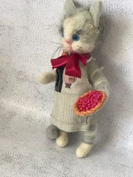 The cat is a cook. Wool Toy