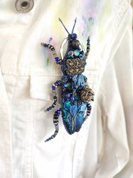 Blue embroidered beetle brooch with vintage metal details, rhinestones and natur