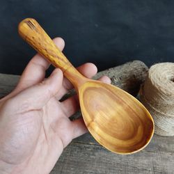 Big handmade wooden scoop with decorated handle from natural birch wood