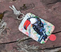 Leather key case with toucan bird embroidery, durable, original accessory
