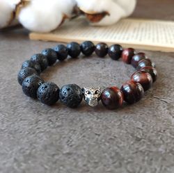 Bracelet made of natural stones Bull's eye and Lava