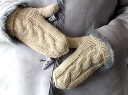 white warm hand-knitted mittens