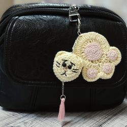 Crochet cat paw. Cute bauble for a girl. Keychain for a bag in the form of a cat's paw. Handmade gift. Key ring.