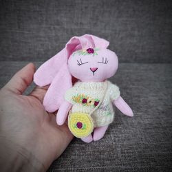Handmade pink bunny. Easter rabbit. Baby cotton toys. Rabbit toy with embroidery.