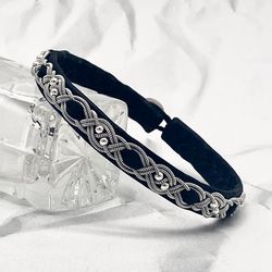 Narrow womens leather bracelet. Sami bracelet. Scandinavian design jewelry. Black and silver bracelet