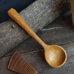 Handmade wooden coffee scoop from natural oak wood for groung coffee and coffee beans