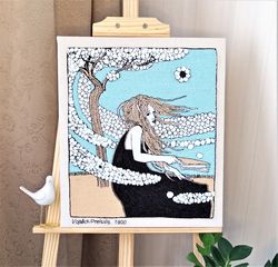 Embroidered picture. In the Hamptons style. Blue sky, white flowers, a girl with her hair fluttering in the wind