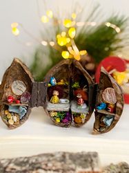 Tiny fairy garden house with wooden dolls, miniature rubber duck, pumpkin. Dollhouse miniatures. fairy garden kit