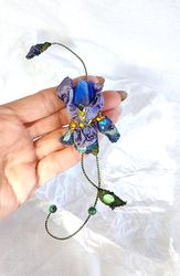 Brooch embroidered iris on wire, blue flower with flexible leaves