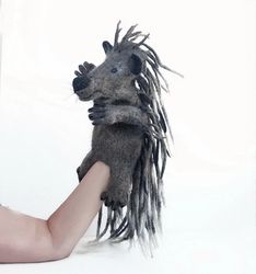 Porcupine wool puppet on the hand for the puppet theater. A unique toy to order.