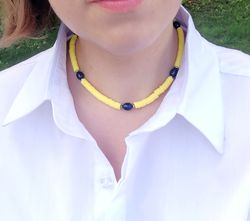 Yellow Necklace and with rubber beads and pearls .