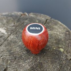Mini cooper red wooden custom shift knob with logo and resin. Gear shifter as a gift accessory for a car lover
