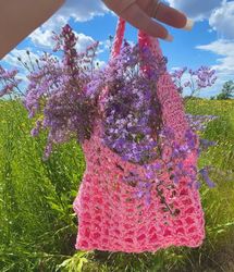 Handmade bag made in pink of raffia