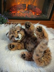Baby cheetah.Realistic handmade plush toy