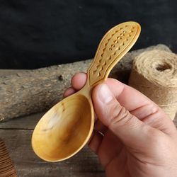 Handmade wooden coffee scoop from natural willow wood with decorated handle for coffee beans or ground coffee