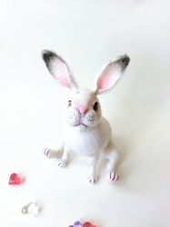 Realistic rabbit. Funny bunny. Rabbit soft toy. Animal plush toy bunny. Stuffed figurine rabbit. Amigurumi crochet bunny