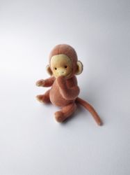 orange monkey plush toy