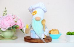 Kitchen Gnome with a Pretzel and with a wooden spoon , Chef Cook Gnome