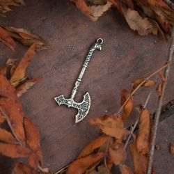 Polex axe pendant on black leather cord. Hatchet handcrafted necklace with celtic ornament. Warrior weapon jewelry.